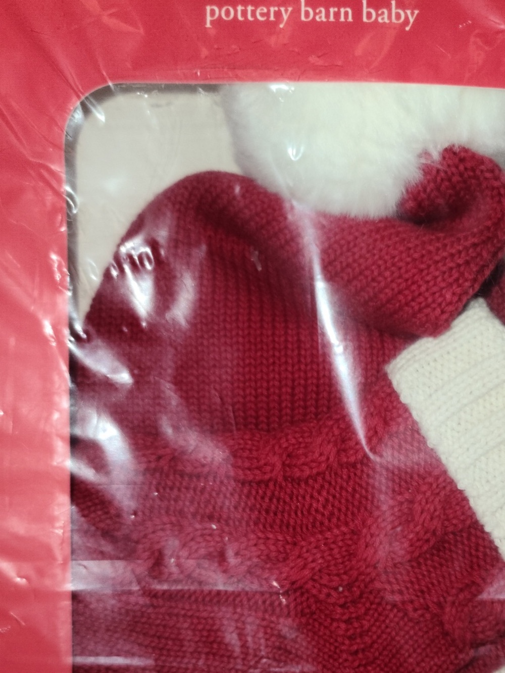 Pottery Barn Kids Santa Hat and Bootie Set in size 3-6 months. New in plastic